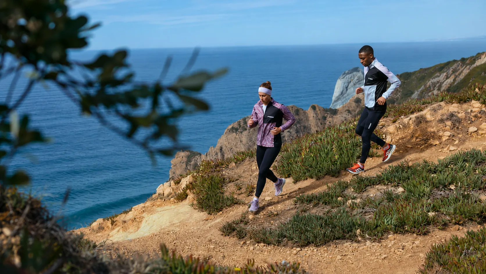 Two trail runners equipped to prepare for their first trail race